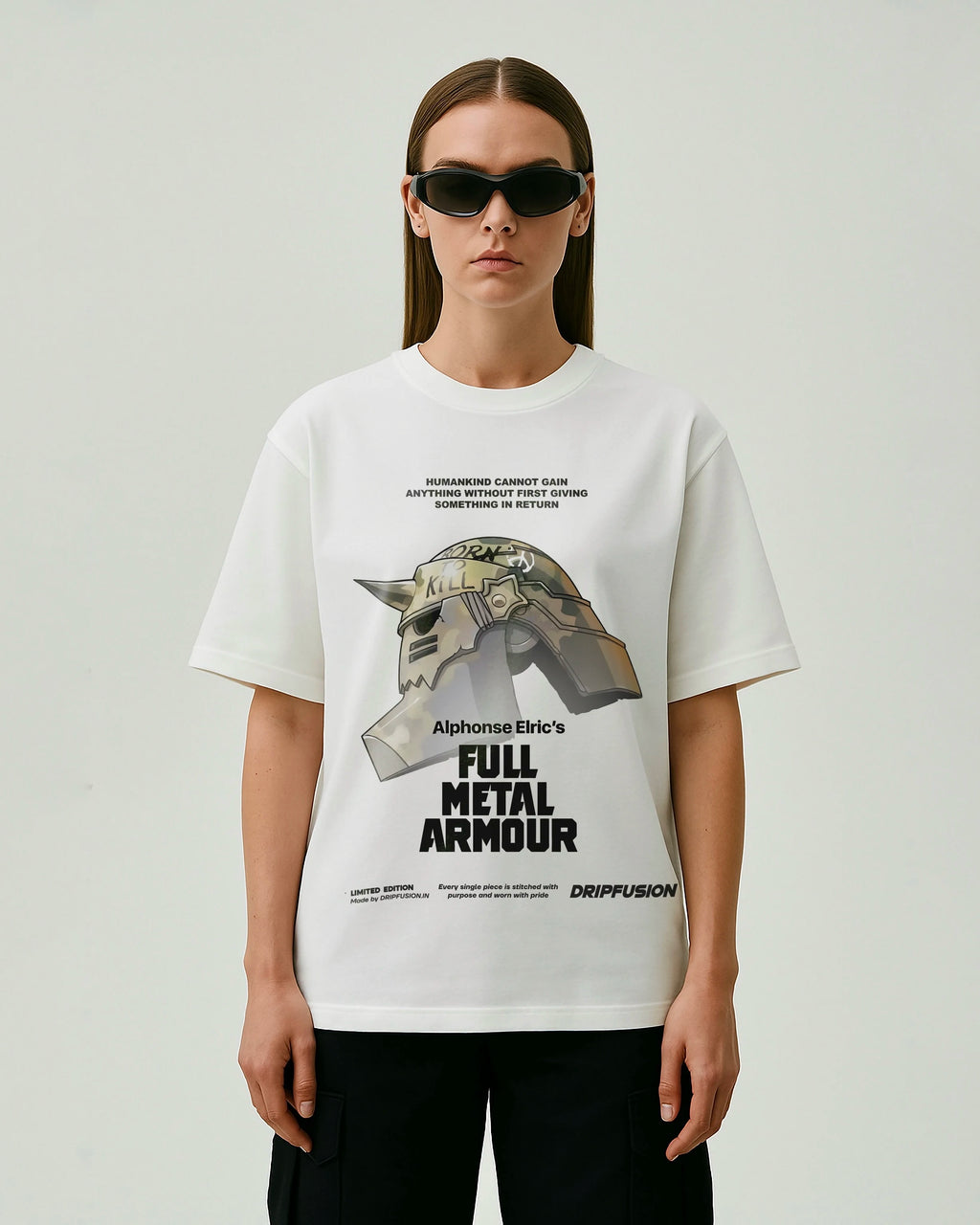 model wearing a white oversized t-shirt with 'Full Metal Alchemist' graphic design on a plain background