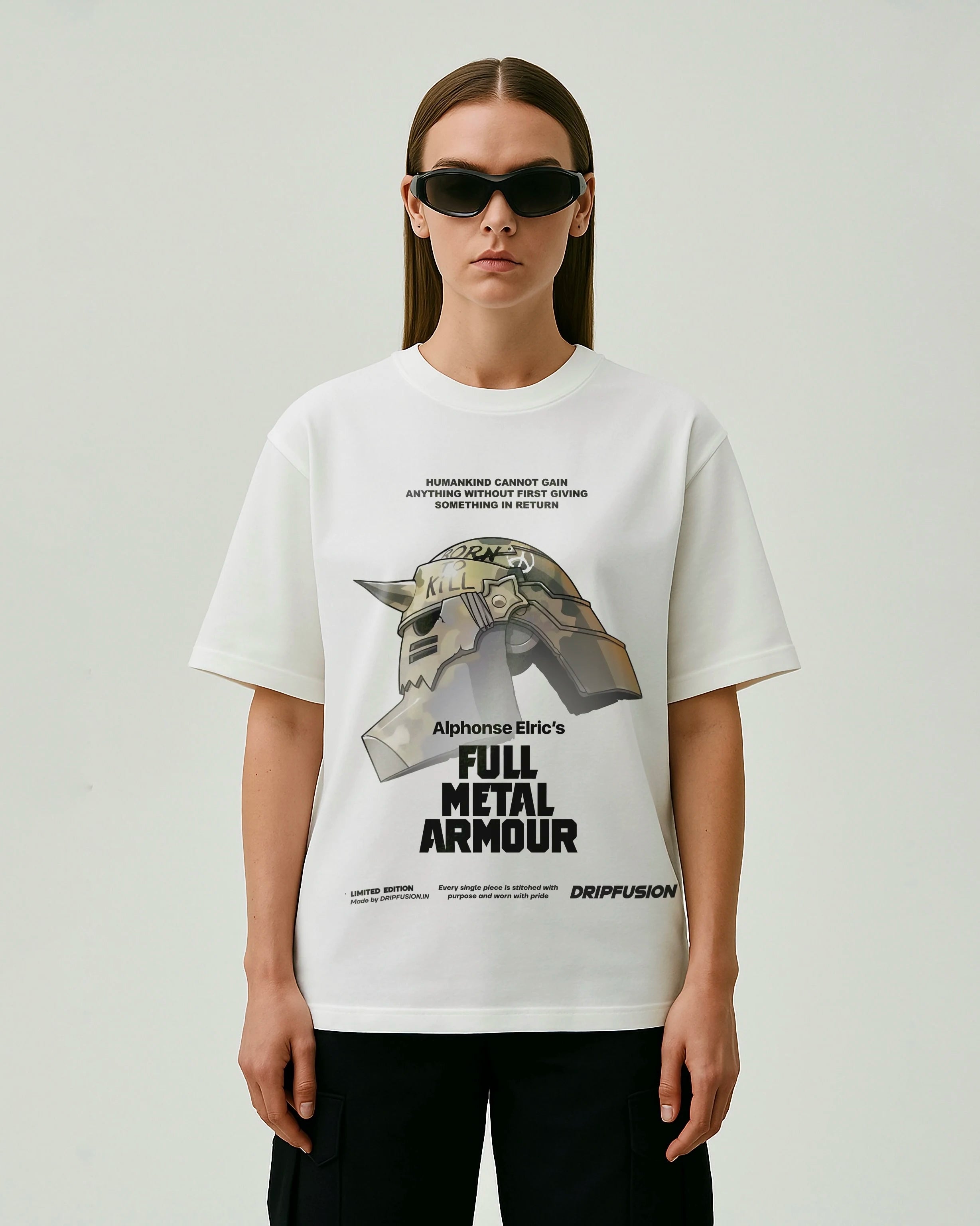 model wearing a white oversized t-shirt with 'Full Metal Alchemist' graphic design on a plain background